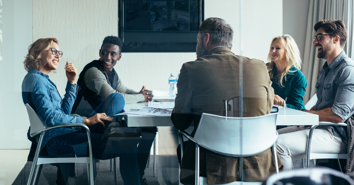 Business Leaders meeting in a room